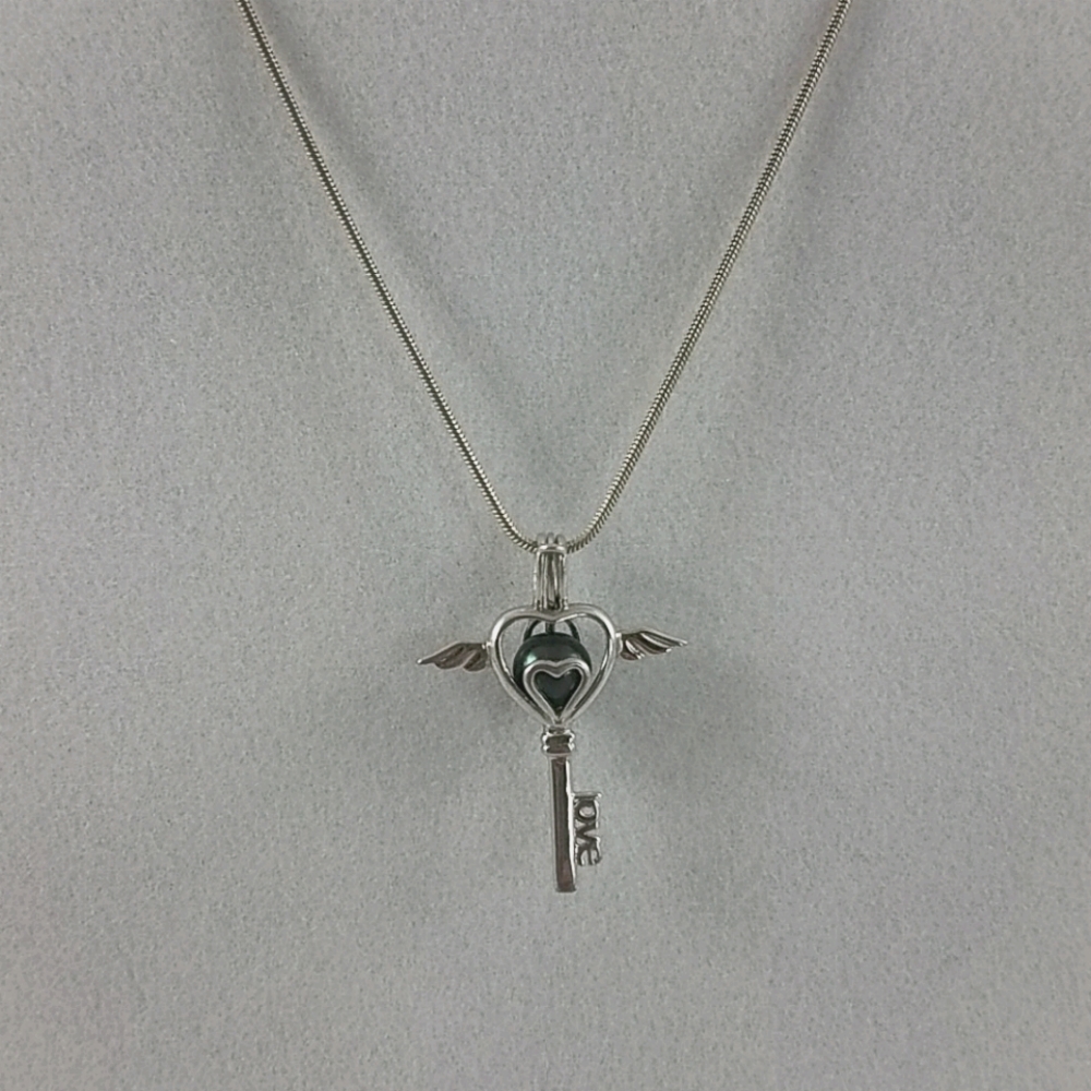 Sterling Silver Heart With Wings Cage Necklace
